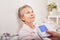 Patient lets nurse measure her blood pressure