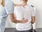 Patient at the physiotherapy doing physical exercises with his therapist