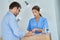 Patient signing documents in dental clinic