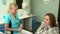 The patient talk to the doctor in an office to dental clinic