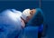 Patient woman in operation room at hospital falling a sleep