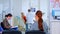 Patients sitting on chairs in waiting room of stomatological clinic filling