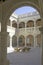 Patio of the Castillo de Luna in Rota through an ancient Mudejar arch, Cadiz province, Andalusia, Spain