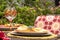 Patio Dining-Yellow plate and hand-painted wine glass, outdoor entertaining