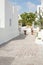 Patio with flowers in Kamari, Santorini, Greece.