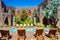 Patio with swimming pool surrounded by sun loungers