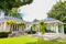 Patio terrace of Upmarket wealthy suburban mansion house with landscaped garden