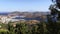 Patmos aerial with trees in foreground panning right to left