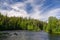 Patoniva river, Oulanka national park Finland blue sky white clouds coniferous forest landscape