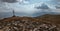 Patriarchal cross on a mountain top with spectacular sun rays through the clouds. Low Tatras Nizke Tatry Crest Trail landscape