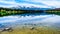 Patricia Lake with reflections of the snow capped peaks of the Rocky Mountains in Jasper National Park