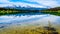 Patricia Lake with reflections of the snow capped peaks of the Rocky Mountains in Jasper National Park