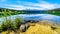 Patricia Lake with reflections of the snow capped peaks of the Rocky Mountains in Jasper National Park