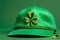 Patrick hat in vibrant green with embroidered clover leaves, isolated against a monochromatic green background