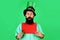 Patricks Day celebration. Surprised Bearded man in green hat with blank poster. Sale. Discount.