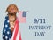 Patriot Day. Adorable puppy and American Flag