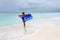 Patriotic Australian woman on beach with flag