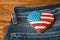 Patriotic cookie on a back pocket of jeans