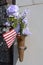 Patriotic grave memorial with all weather artificial flowers