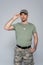 patriotic soldier in t-shirt adjusting