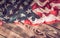 Patriotic symbols. American flag on an old wooden background