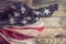 Patriotic symbols. American flag on an old wooden background