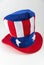 Patriotic Uncle Sam style red, white and blue hat on a white background