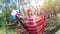 Patriotic woman smile with USA flag and balloons, America independent day