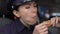 Patrol woman feeling unpleasant taste eating burger, low quality of street food
