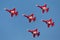 Patrouille Suisse formation display team of the Swiss Air Force flying Northrop F-5E fighter aircraft joined by the Swiss PC-7 tea