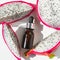 pattaya dragon fruit extract for skin care, dark glass dropper bottle with essential oil, facial cosmetics.