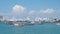 Pattaya, Thailand. - April 6, 2016 : Ferry Boats and fishing boat sail in the sea, connecting Pattaya downtown city and Koh Larn,