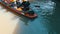 Pattaya, Thailand - December 18, 2017: Different boats with tourists riding them on the river in a floating market