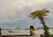 PATTAYA,THAILAND - OCTOBER 20,2018:Pattaya Beer GardenBeach Road A young,female and Chinese tourist rests in a beer garden