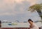 PATTAYA,THAILAND - OCTOBER 20,2018:Pattaya Beer GardenBeach Road A young,female and Chinese tourist rests in a beer garden