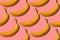 Pattern. Banana concept. Group of bananas on pink background. C