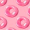 Pattern of bright pink inflatable rubber circles on a pale pink background