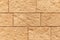 pattern of brown stone cladding wall tile texture and seamless background