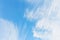 Pattern of cirrus clouds on the blue sky background