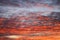 Pattern of cirrus clouds on the colored sinrise sky background