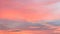 Pattern of cirrus clouds on the colored sinrise sky background