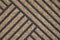 Pattern of coconut shell fiber mat with black geometry shape