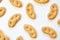 Pattern from cookies, sweet pretzels in sugar on a white background, isolated, in a close-up, top view