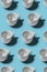 Pattern. Cup concept. Group of white cups on blue background. Cr