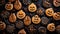 Pattern of decorated cookies in the shape of scary orange sugar pumpkins and chocolate spider web on dark scary background