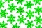 A pattern of decorative green snowflakes on a white background