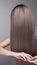 Pattern of deep purple hair color. Strong and shiny hair after s