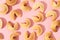 Pattern with fortune cookies on pink background with deep long shadows