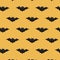 Pattern halloween ornament. Halloween design. Halloween pattern with bats on a yellow background