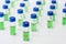 Pattern from HPLC glass vials with green fluid. Pharmaceuticals and chemical analysis